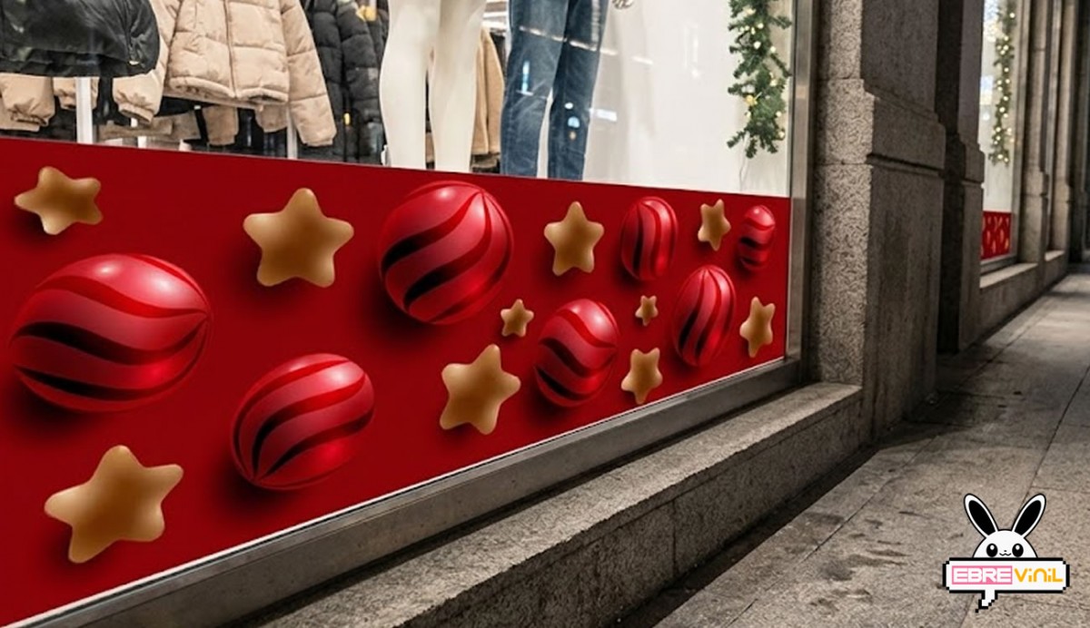 Instalación vinilo navideño empalmado en cristal de tienda
