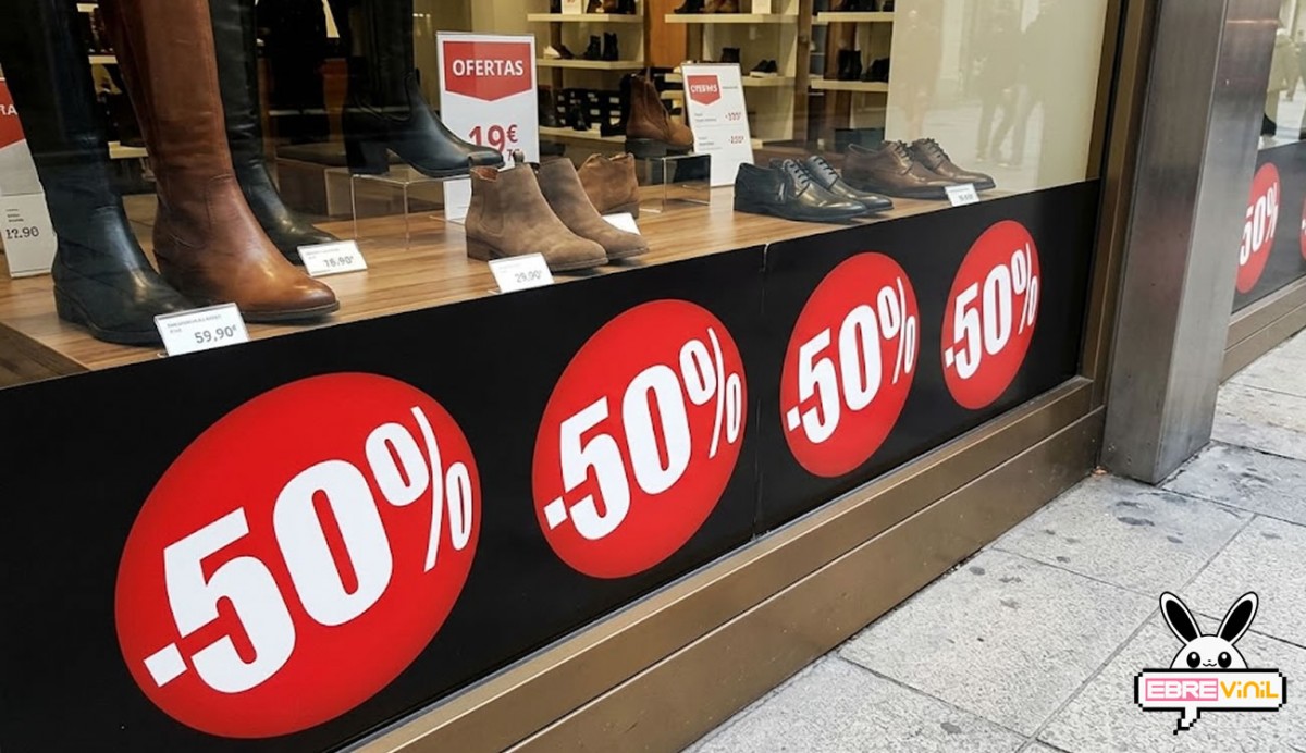 Vinilo adhesivo círculos rojos descuento personalizado escaparate tienda